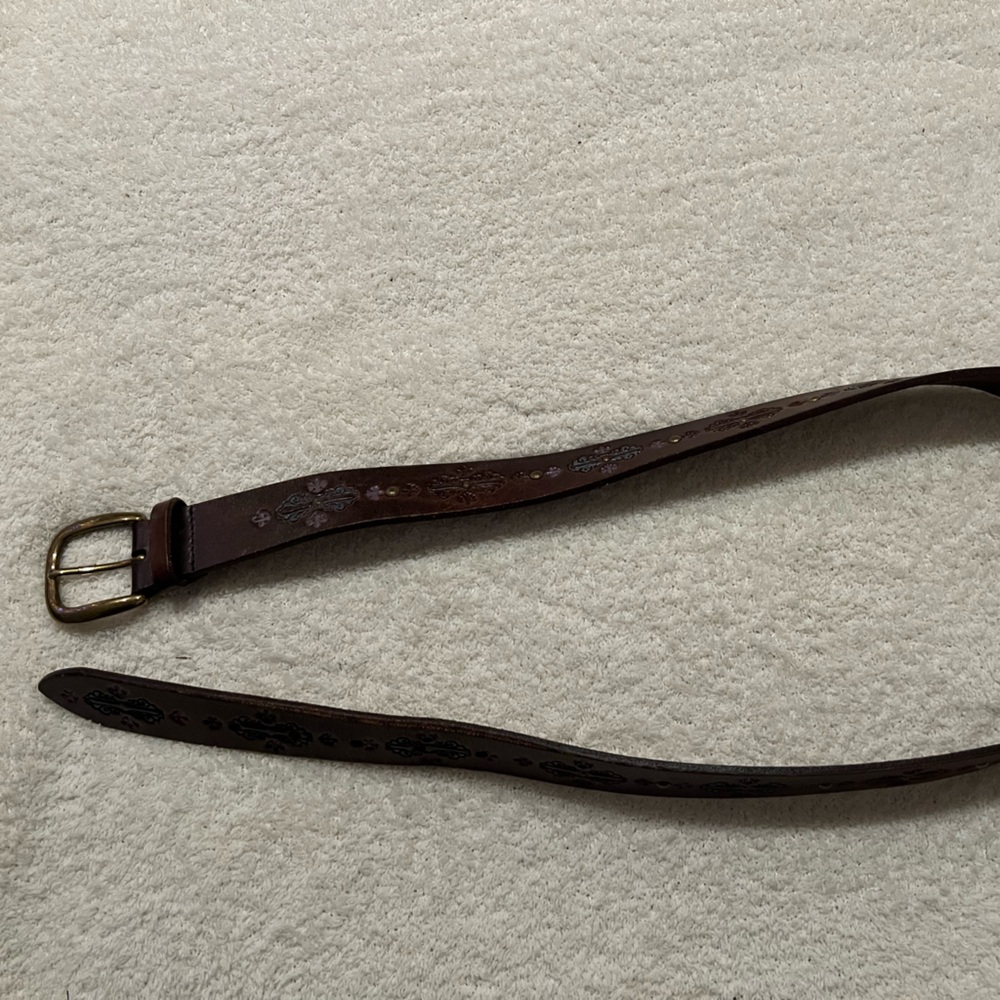 Brown leather belt with stamped pattern and antique brass buckle